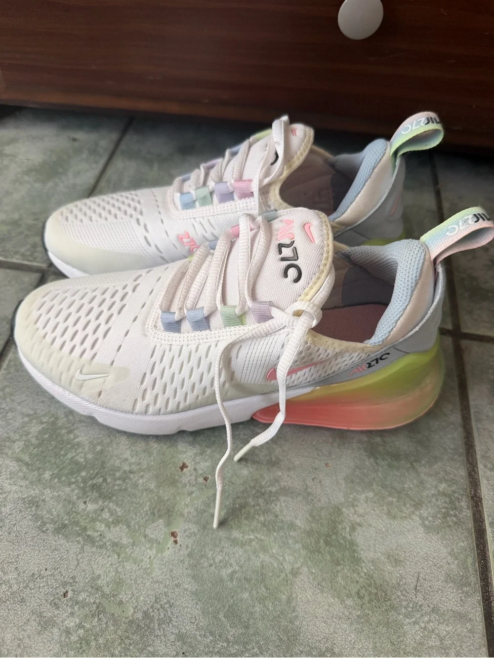 Nike Women's White Sneakers with Pastel Accent Loops